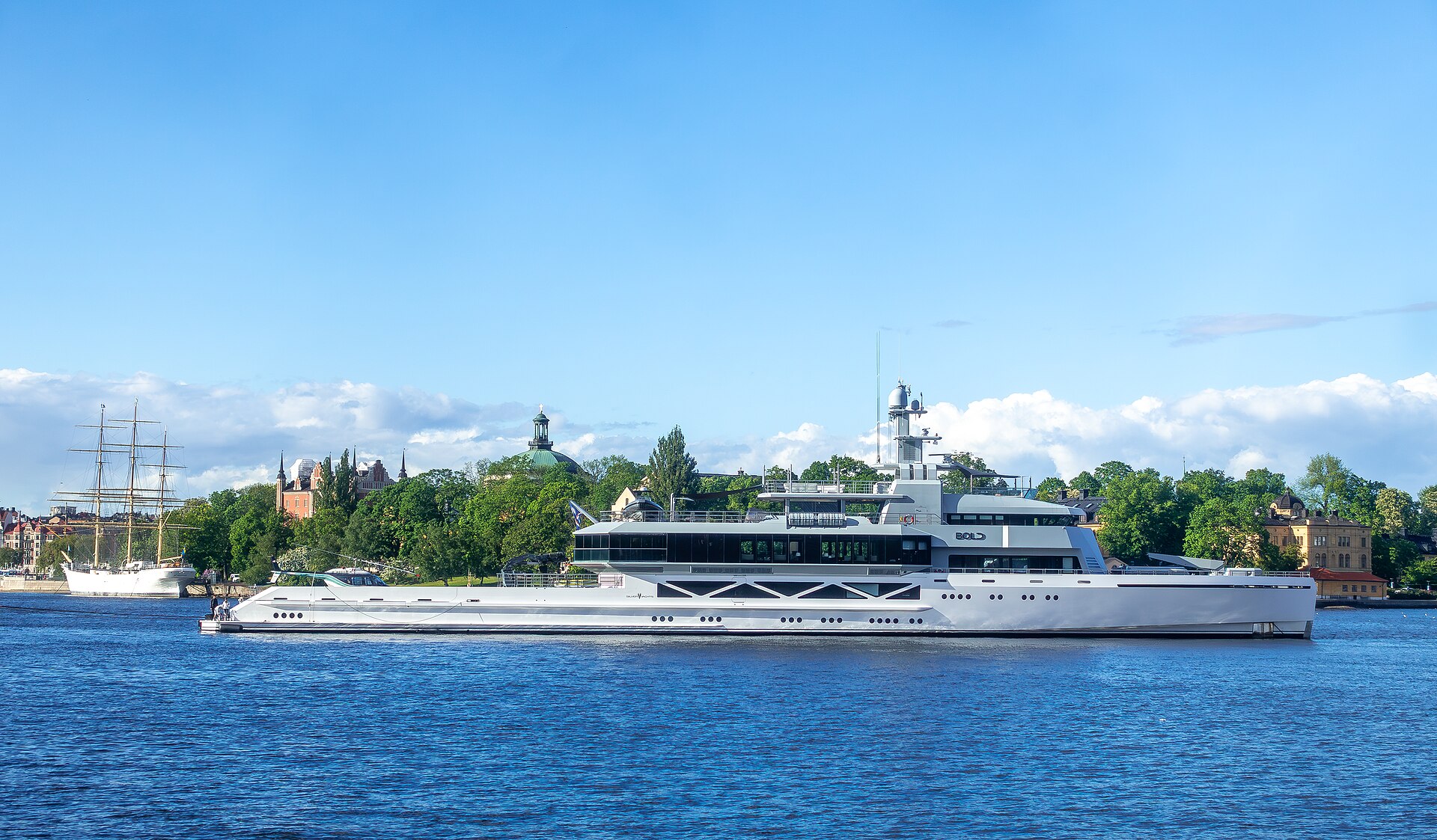 BOLD seen from the other side in Stockholm, with the silver-white hull and dark windows visible.